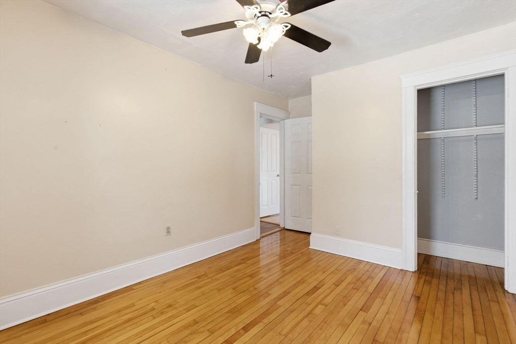 143 Commonwealth Avenue Worcester, MA 01604 - Photo 17 of 35 a view of an empty room with wooden floor