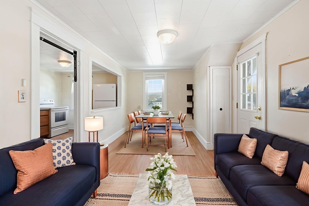 143 Commonwealth Avenue Worcester, MA 01604 - Photo 23 of 35 a living room with furniture and wooden floor