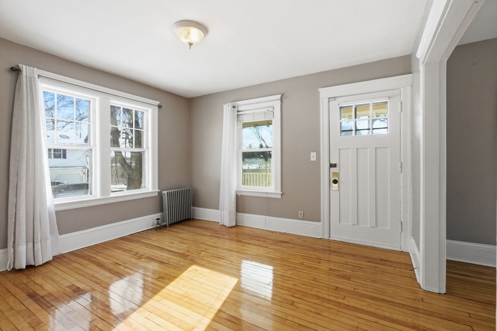 143 Commonwealth Avenue Worcester, MA 01604 - Photo 7 of 35 a bedroom with a bed and a window