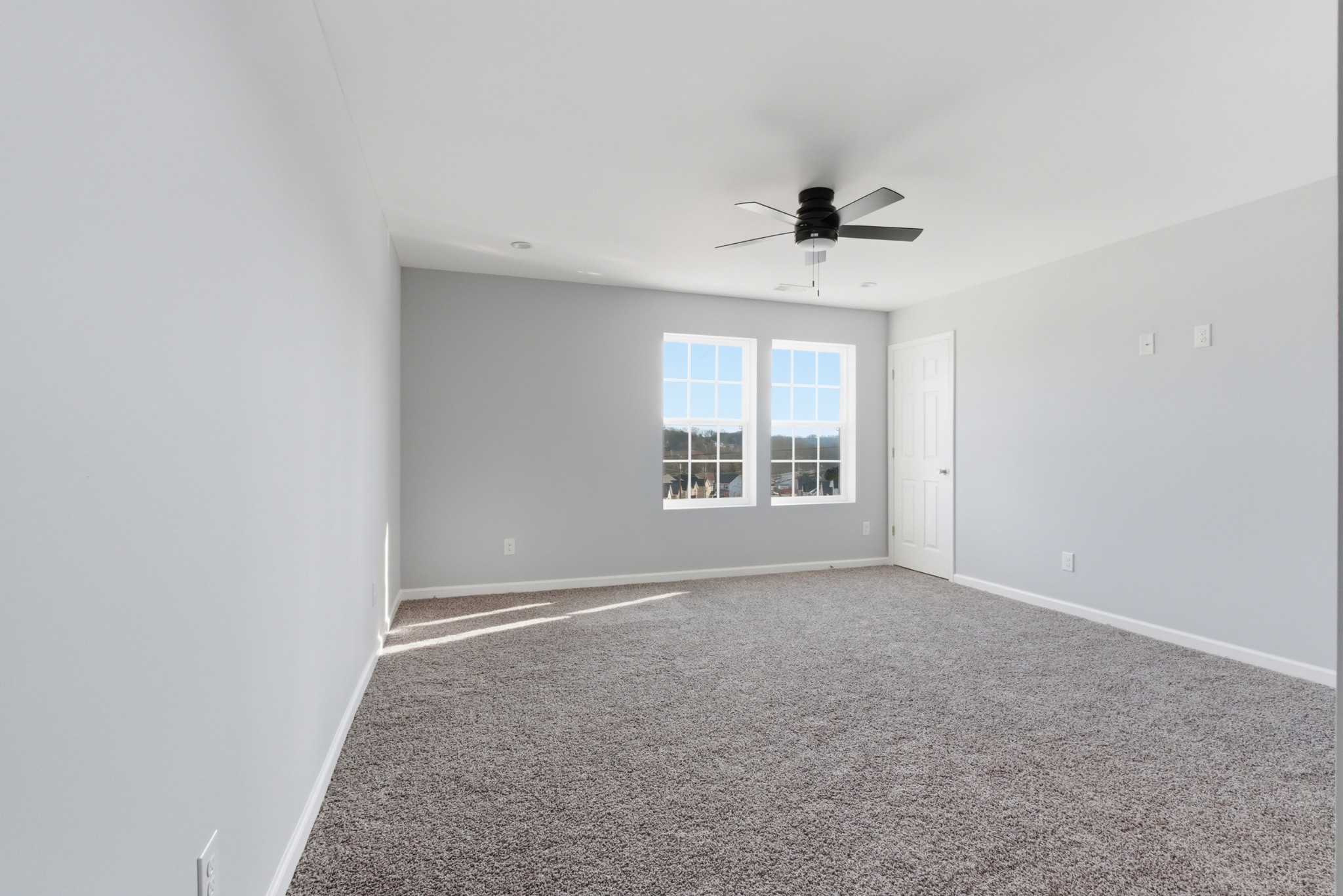 4741 Longbranch Antioch, TN 37013 - Photo 32 of 39 an empty room with windows and ceiling fan