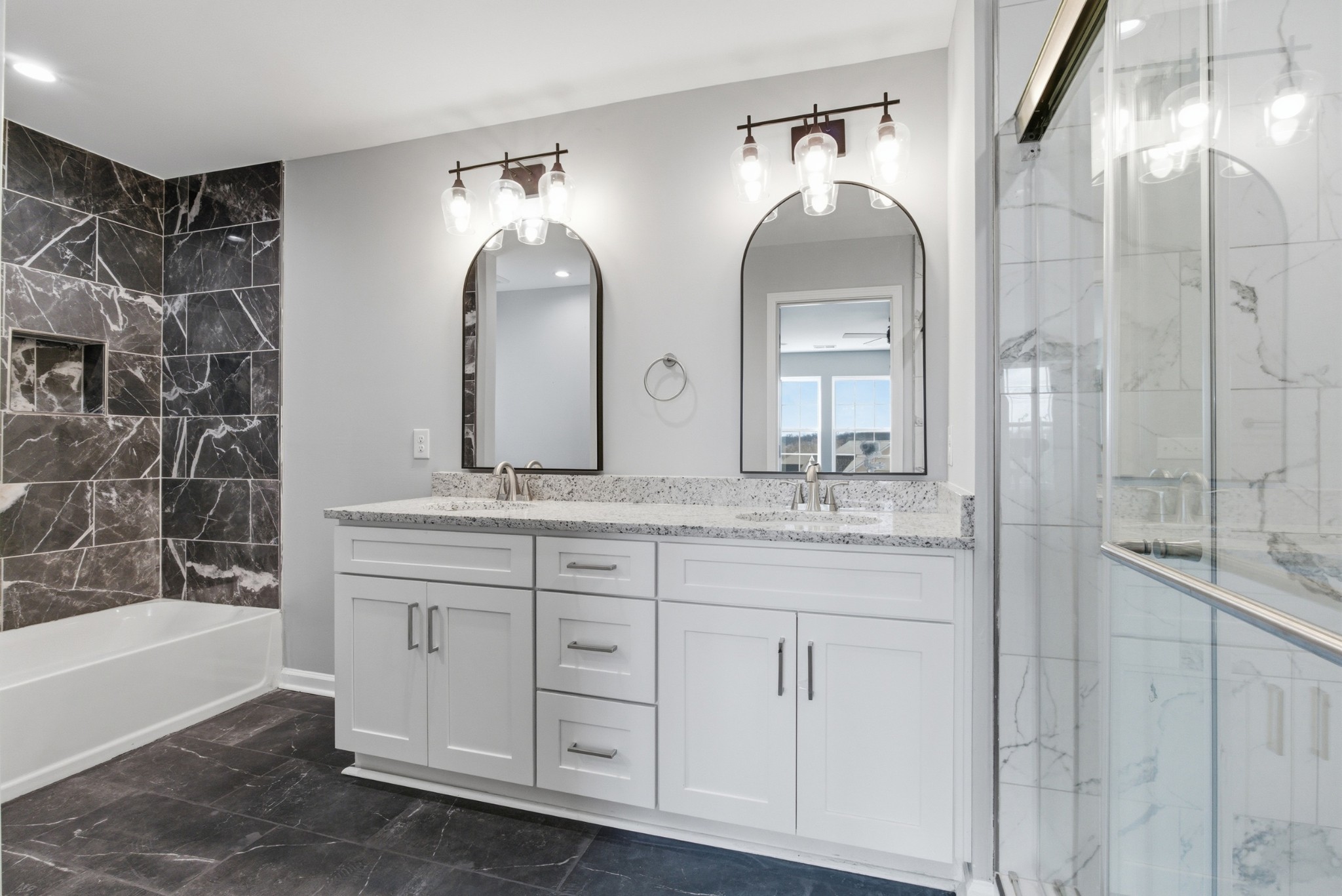4741 Longbranch Antioch, TN 37013 - Photo 34 of 39 a bathroom with double vanity sinks and a mirror