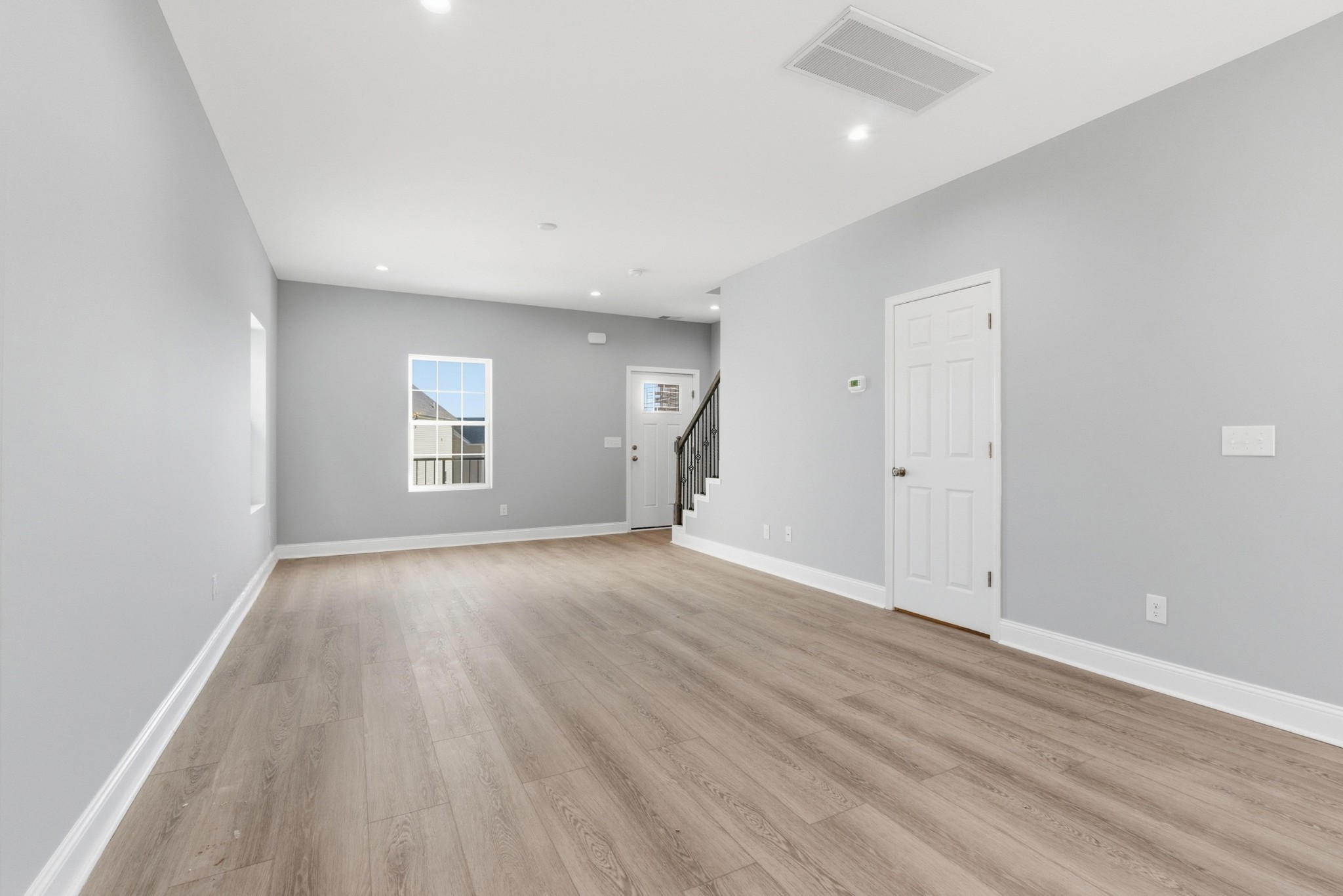 4741 Longbranch Antioch, TN 37013 - Photo 6 of 39 wooden floor in an empty room with a window