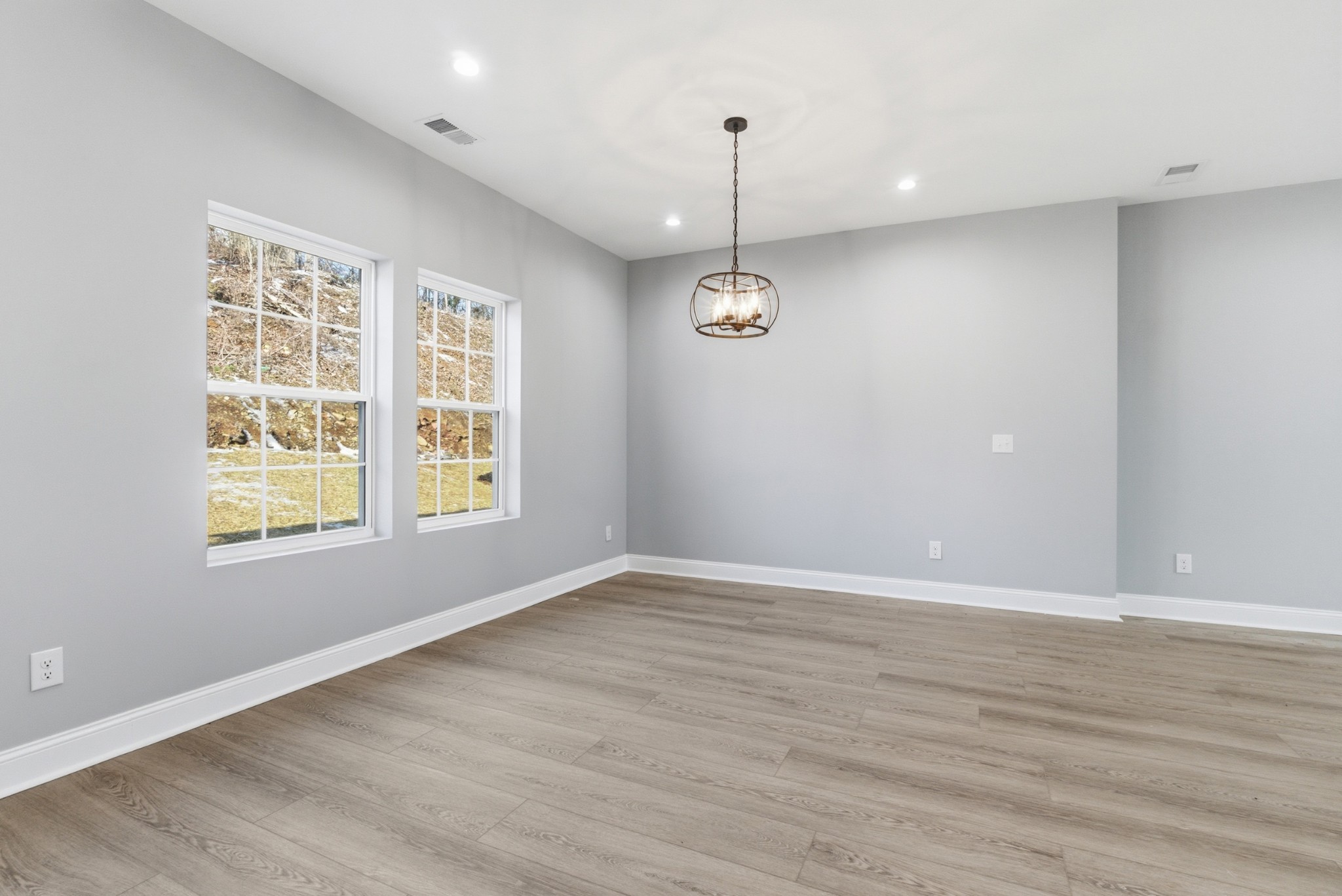 4741 Longbranch Antioch, TN 37013 - Photo 10 of 39 an empty room with wooden floor and windows
