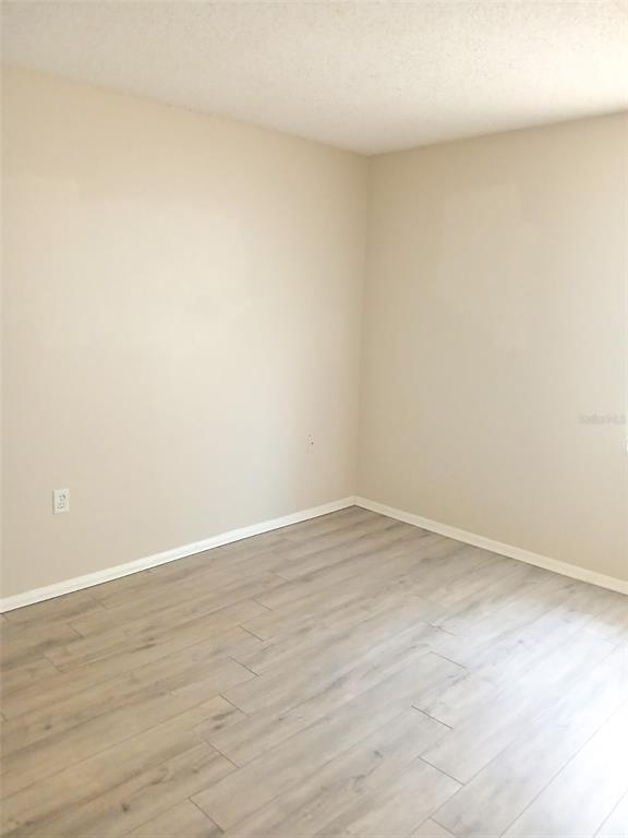 4335 Aegean Drive, Unit 108A Tampa, FL 33611 - Photo 8 of 16 a view of an empty room