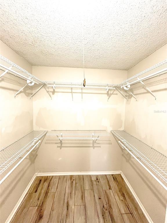 4335 Aegean Drive, Unit 108A Tampa, FL 33611 - Photo 9 of 16 a view of a room with racks on the wall