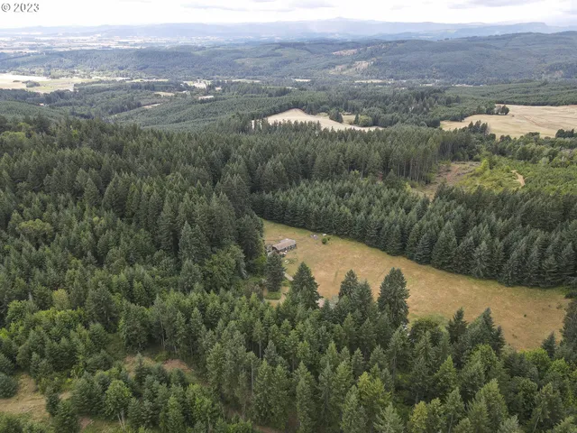 an aerial view of mountain with lake view