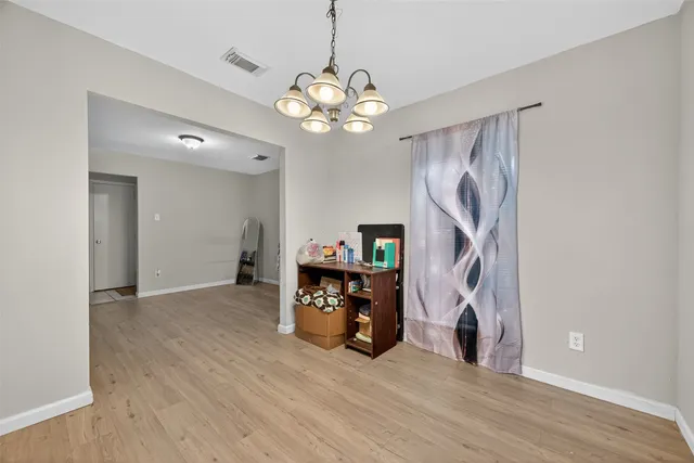 a view of a livingroom with a chandelier