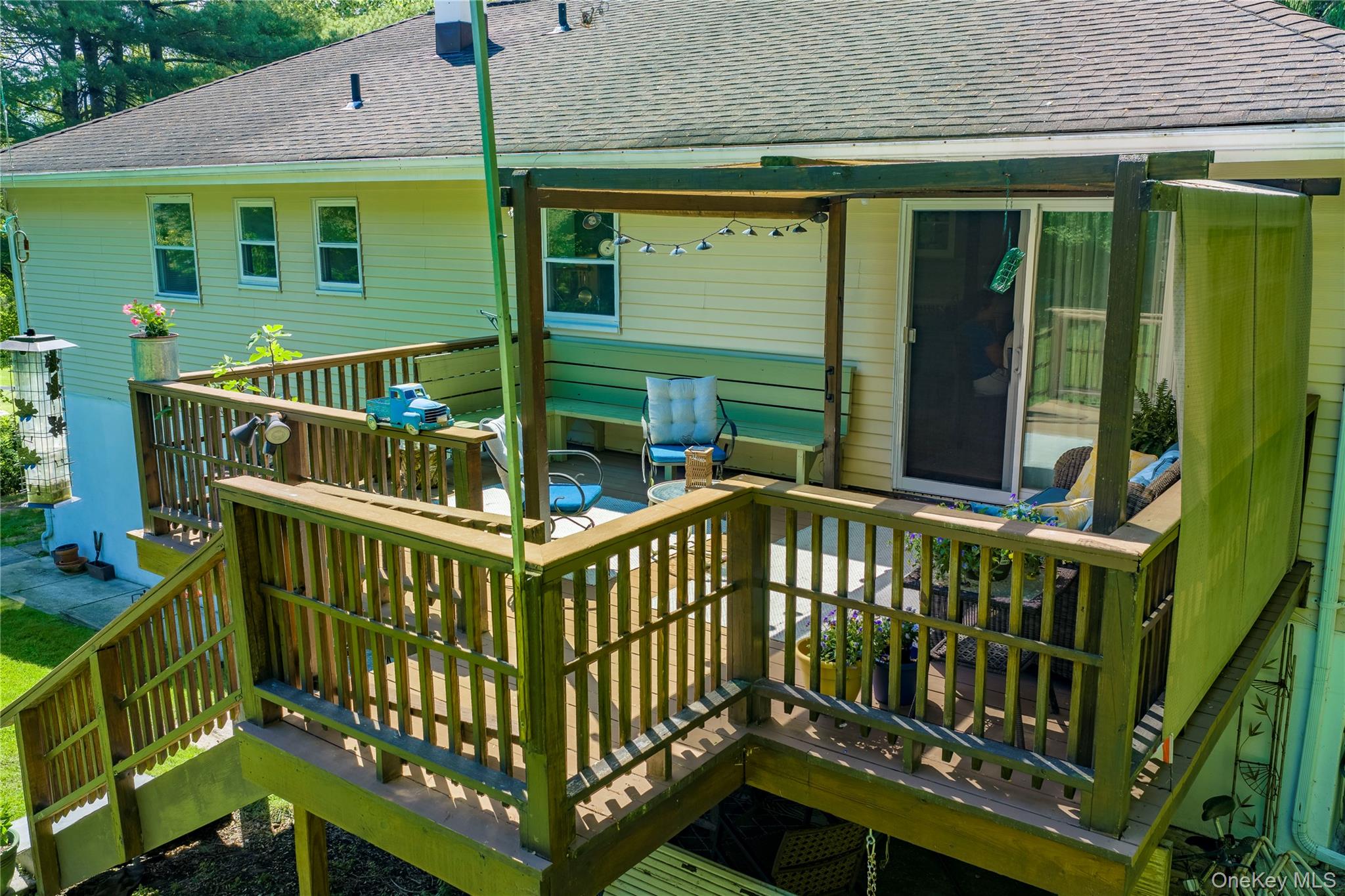 32 Cobb Road Brewster, NY 10509 - Photo 6 of 49 a view of a house with a wooden deck