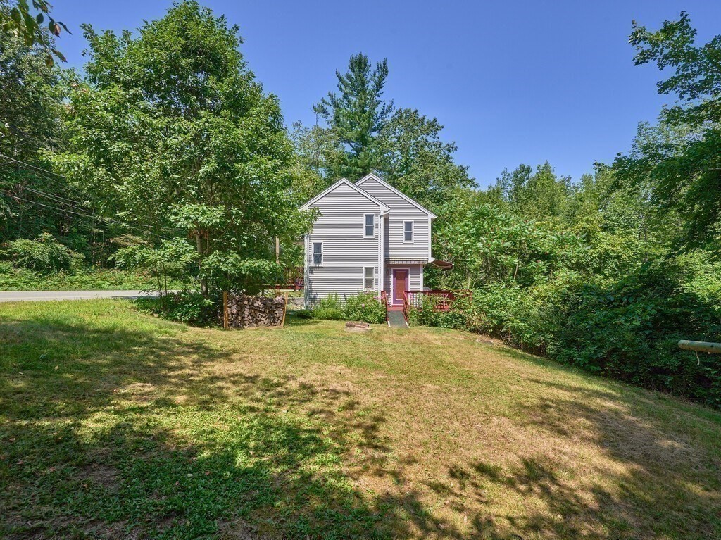 189 Maple Avenue Rutland, MA 01543 - Photo 24 of 27 a house view with a garden space