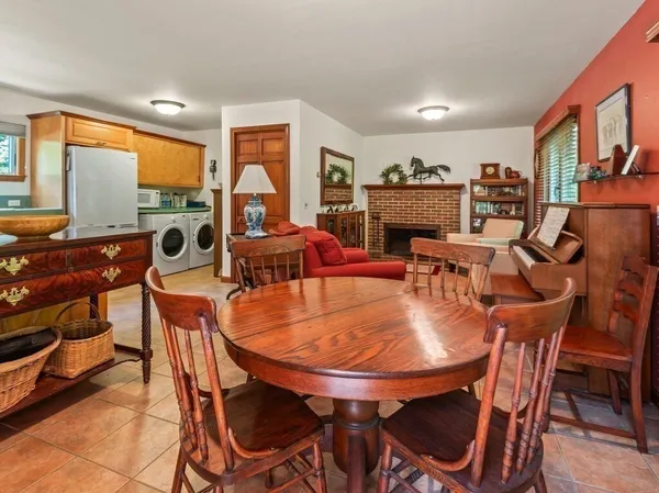 a view of a dining room with furniture window and outside view