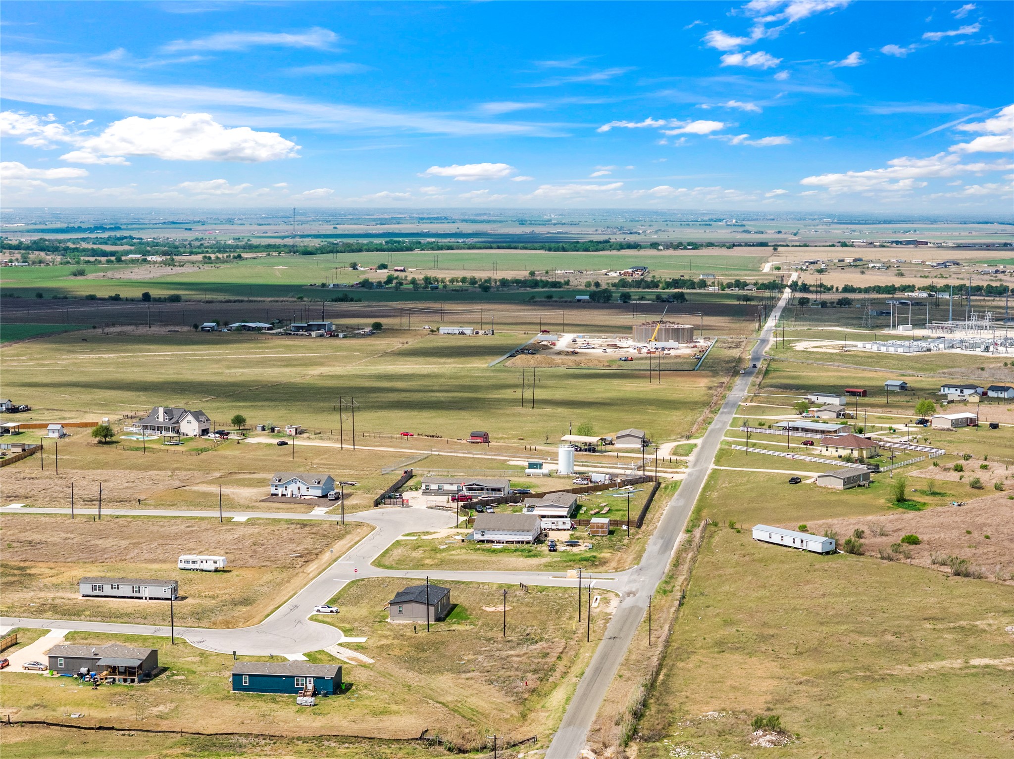 5101 County Road 463 Elgin, TX 78621 - Photo 12 of 38 a view of a swimming pool with an ocean view