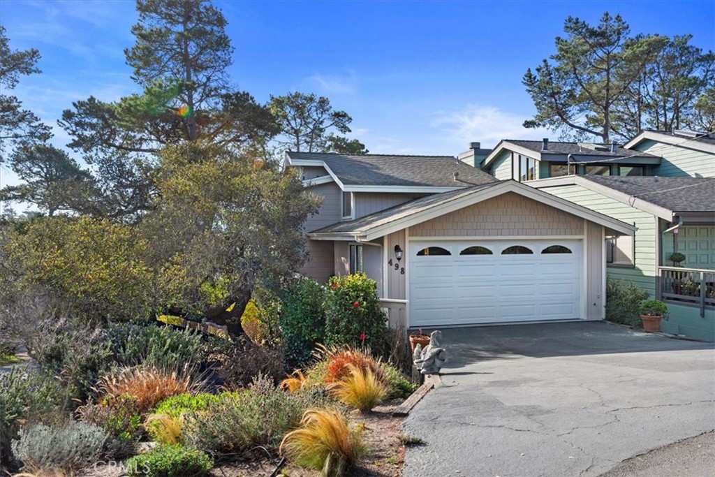 498 Croyden Lane Cambria, CA 93428 - Photo 2 of 68 front view of a house with a yard