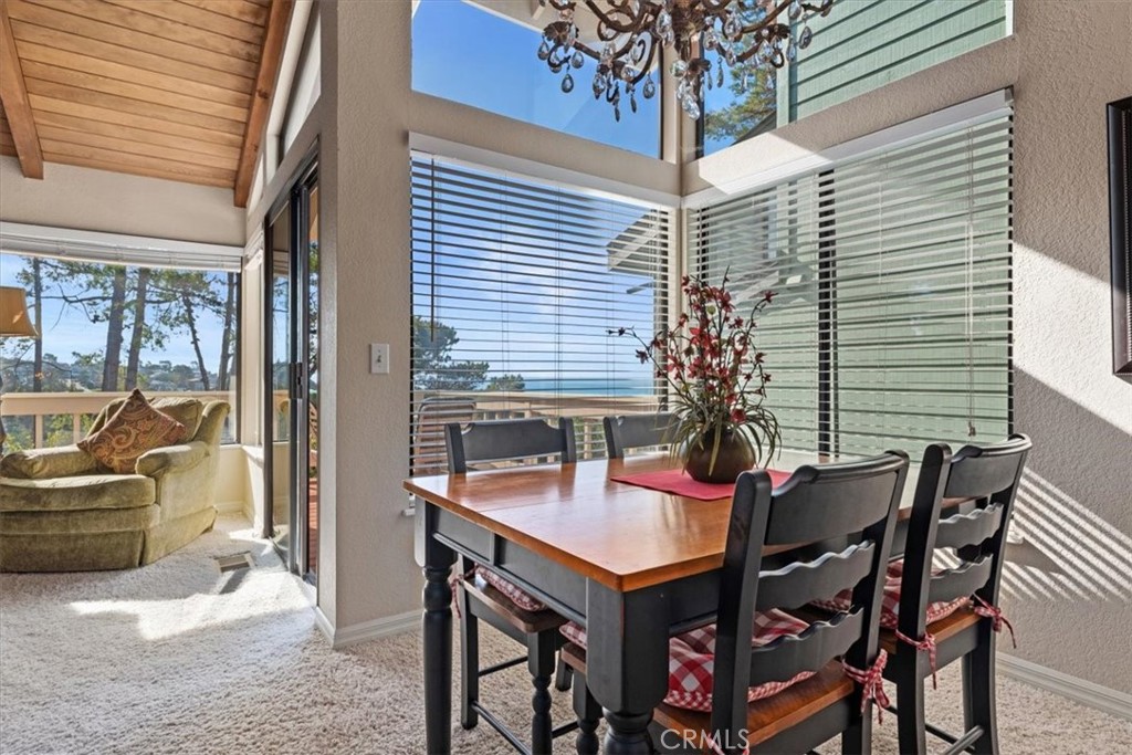 498 Croyden Lane Cambria, CA 93428 - Photo 27 of 68 a view of a dining room with furniture window and outside view