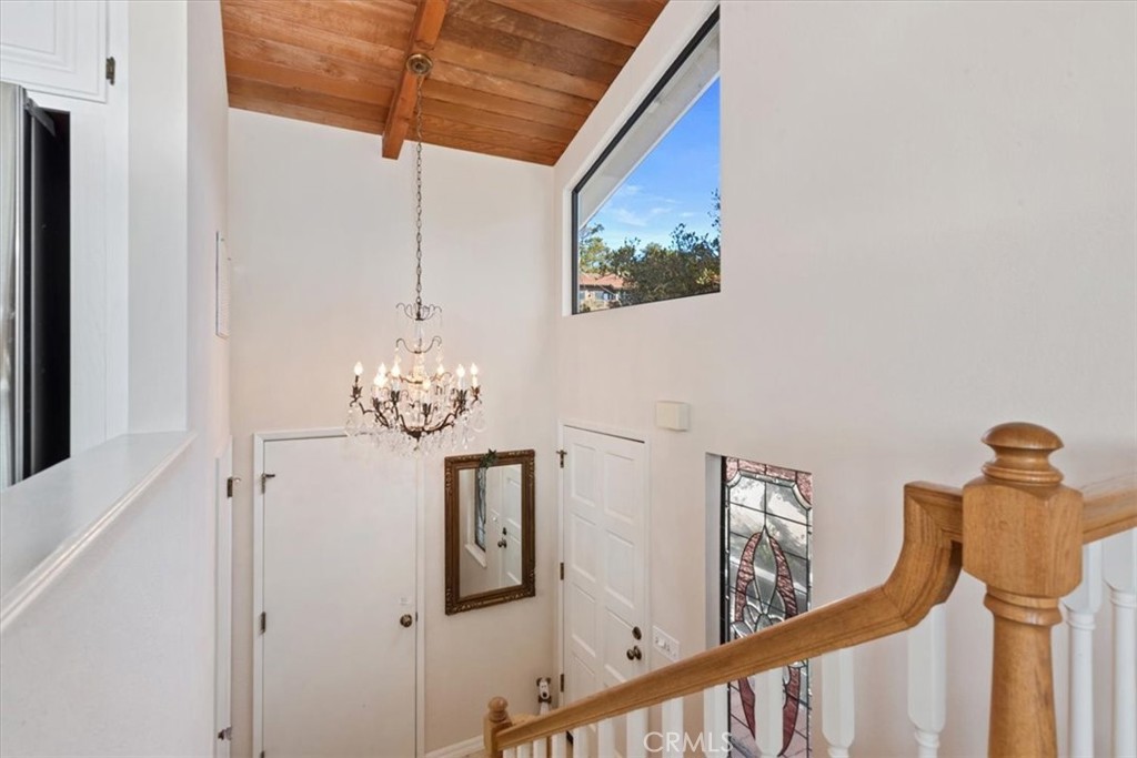 498 Croyden Lane Cambria, CA 93428 - Photo 57 of 68 a view of a chandelier fan and wooden floor