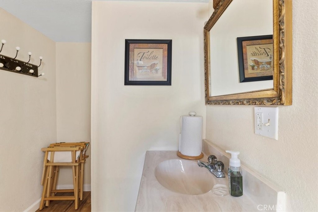 498 Croyden Lane Cambria, CA 93428 - Photo 67 of 68 a bathroom with a toilet and a sink