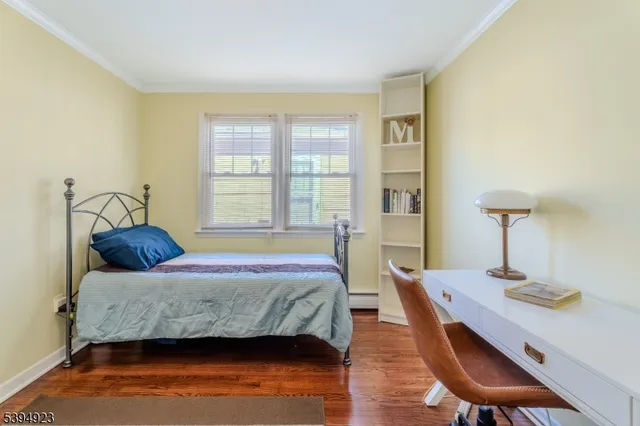 a bedroom with a bed and a table