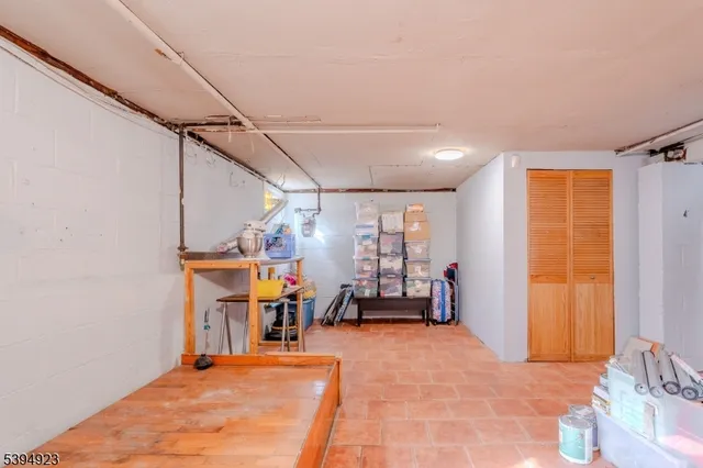 a view of a room with a hallway