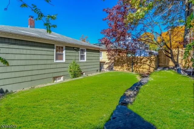 a view of a backyard with a garden
