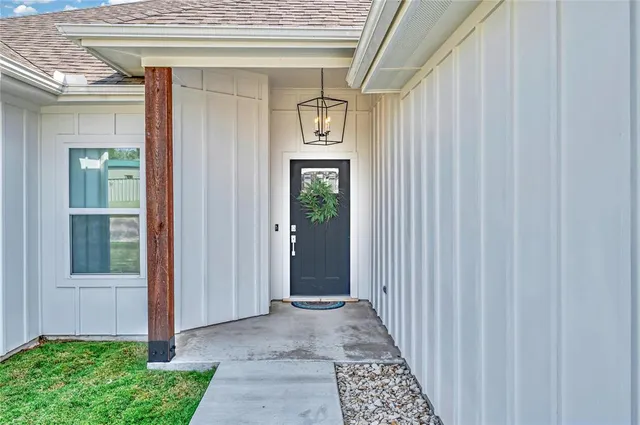 a view of a door and wooden door