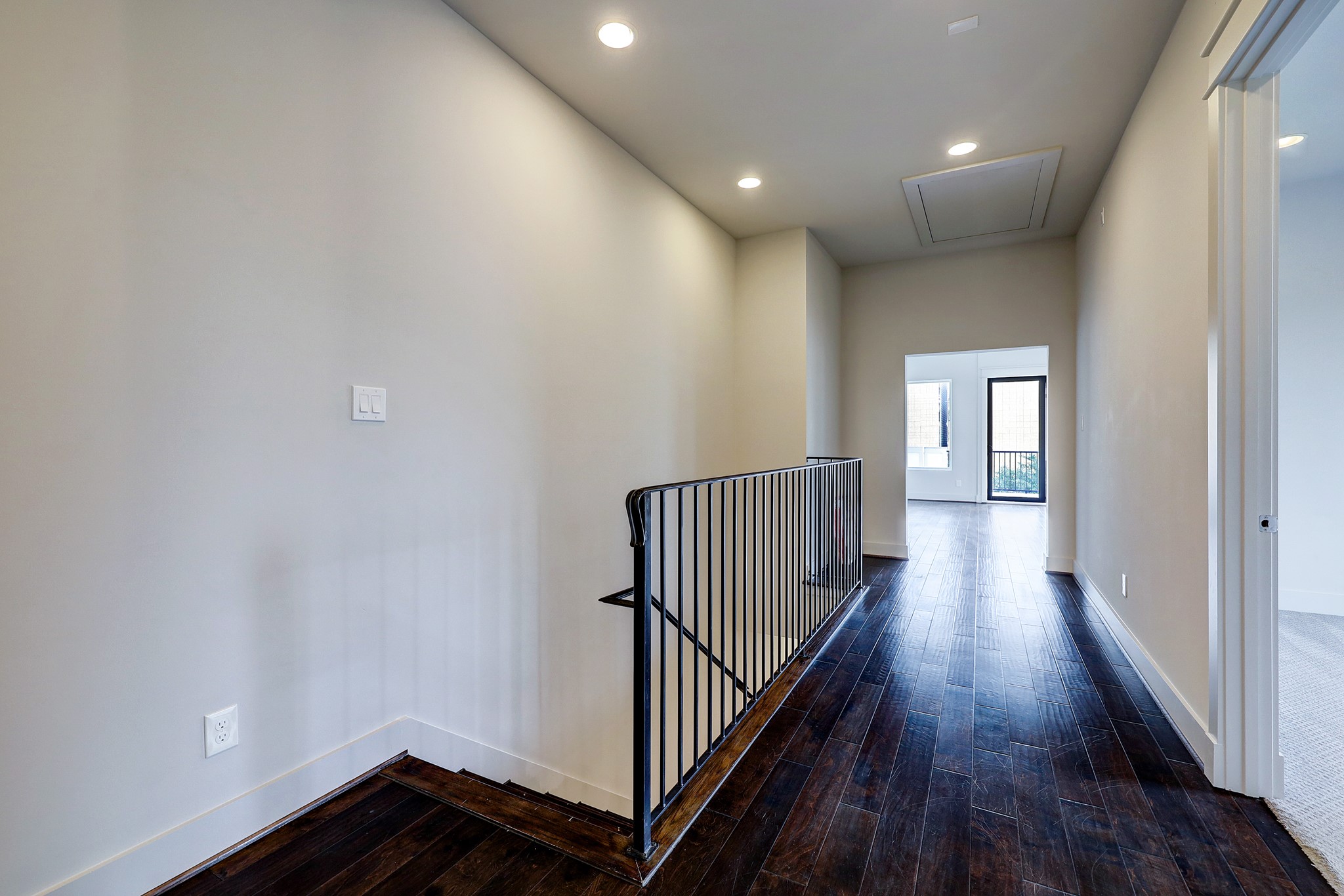609 West Pierce Street Houston, TX 77019 - Photo 11 of 32 a view of a hallway with wooden floor