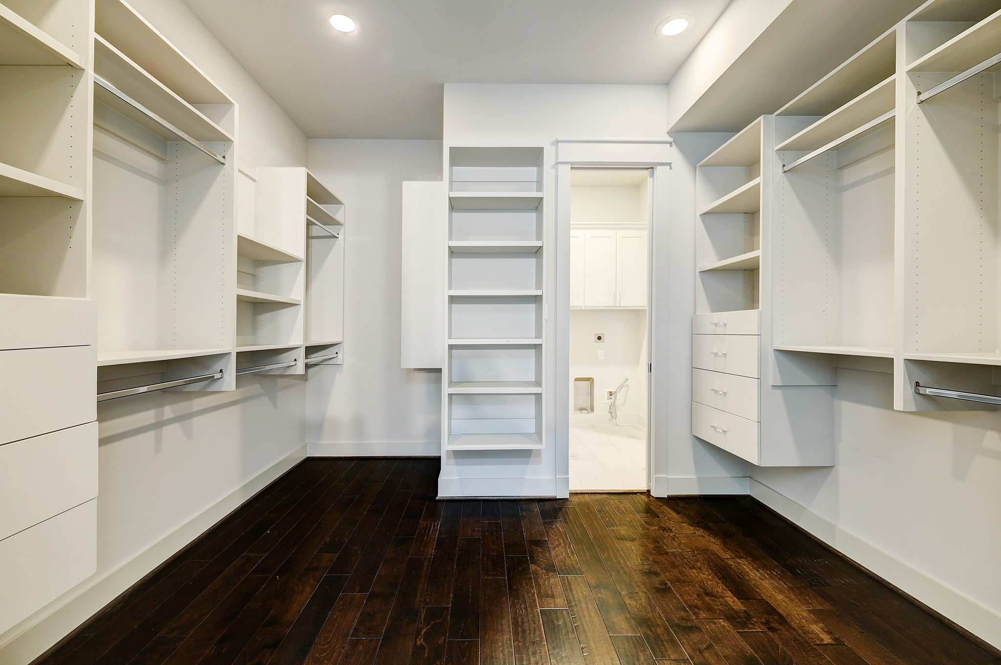 609 West Pierce Street Houston, TX 77019 - Photo 17 of 32 a view of walk in closet with empty racks