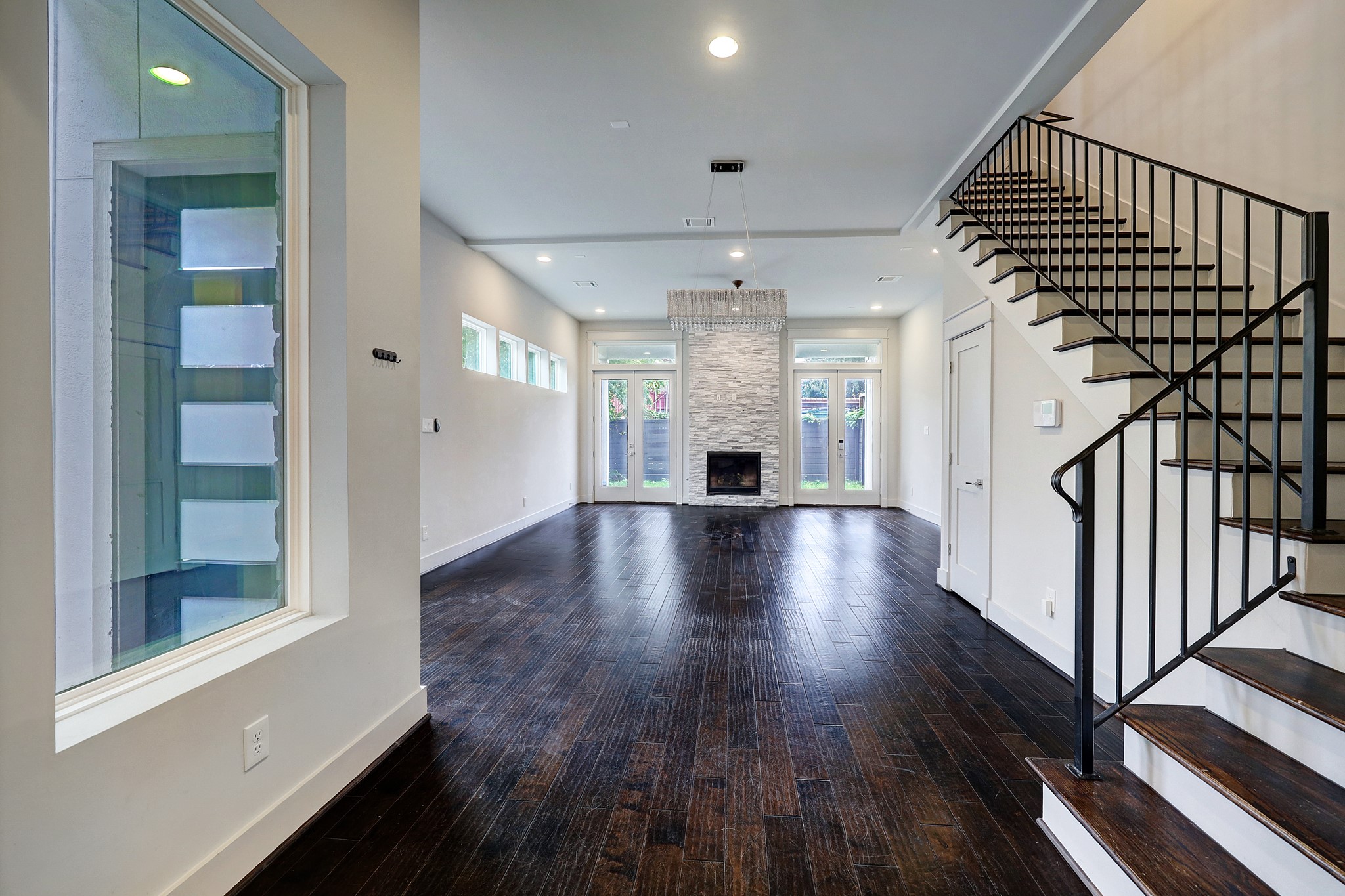 609 West Pierce Street Houston, TX 77019 - Photo 5 of 32 a view of entryway with wooden floor