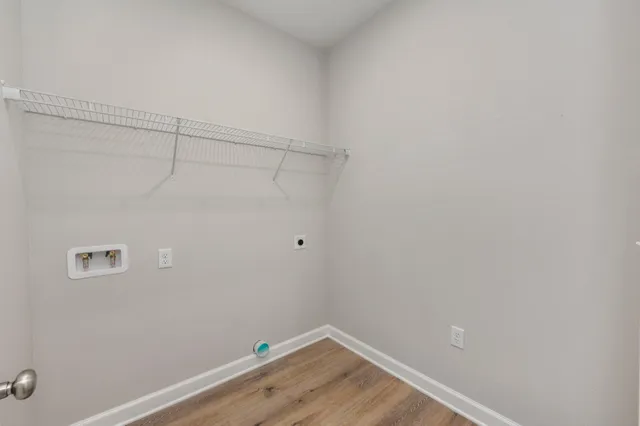 a view of a room with empty racks on the wall