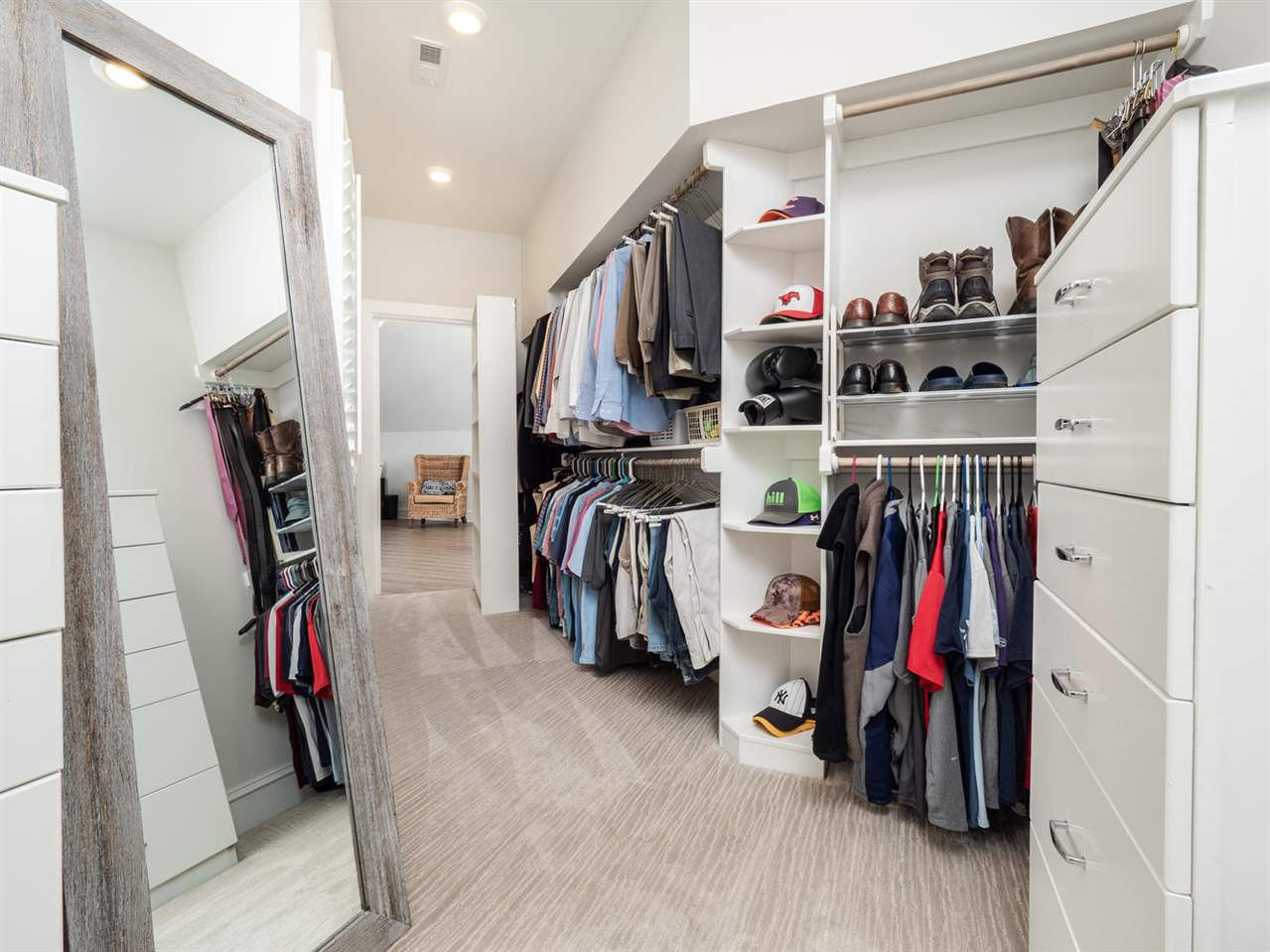 3309 Thomas Road Raleigh, NC 27607 - Photo 22 of 30 This is only one side of the master closet! And features the secret bookshelf entry into the Bonus Room! Master Closet