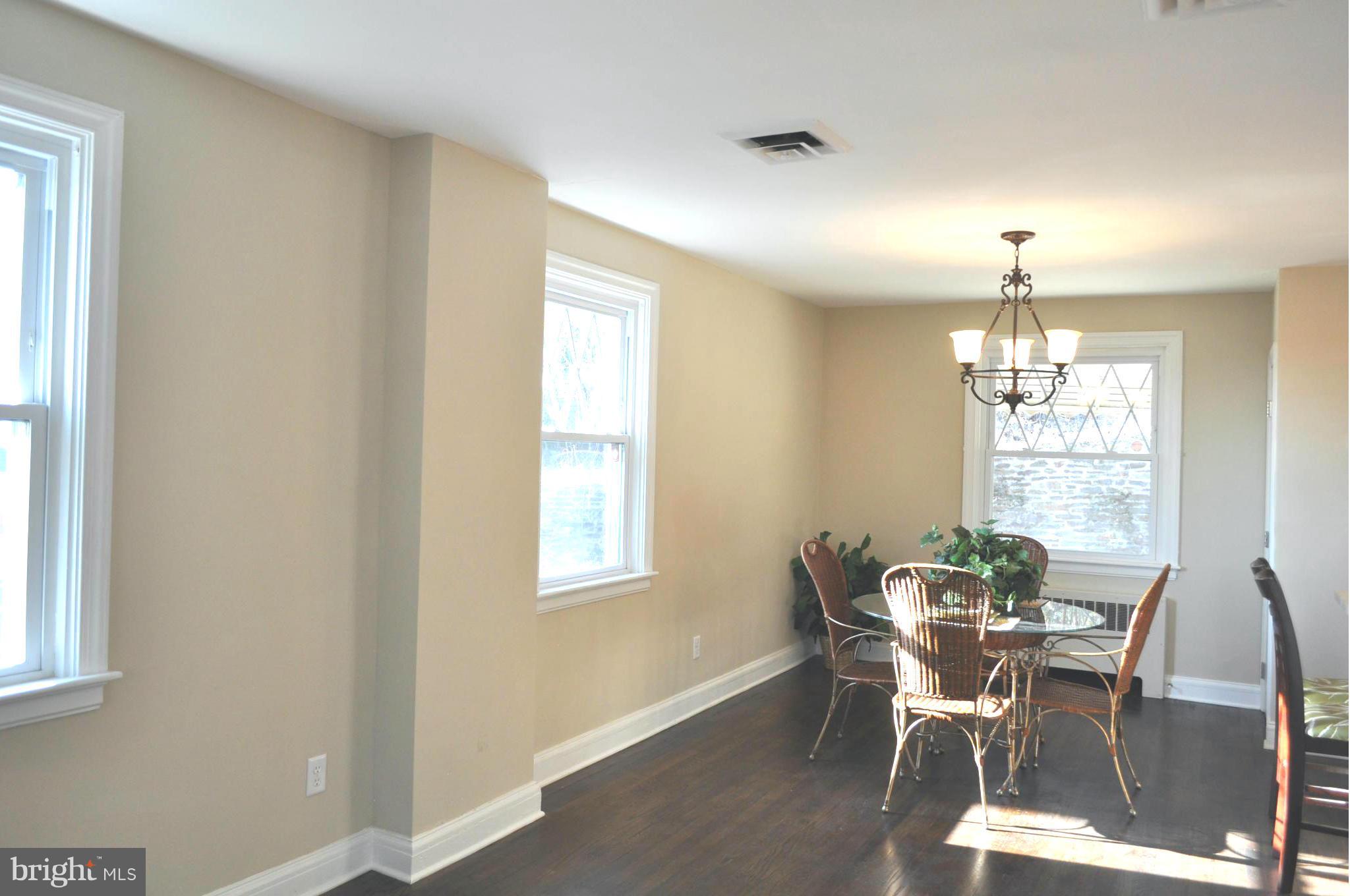 3900 Rexmere Road Baltimore, MD 21218 - Photo 16 of 23 a dining room with furniture and window