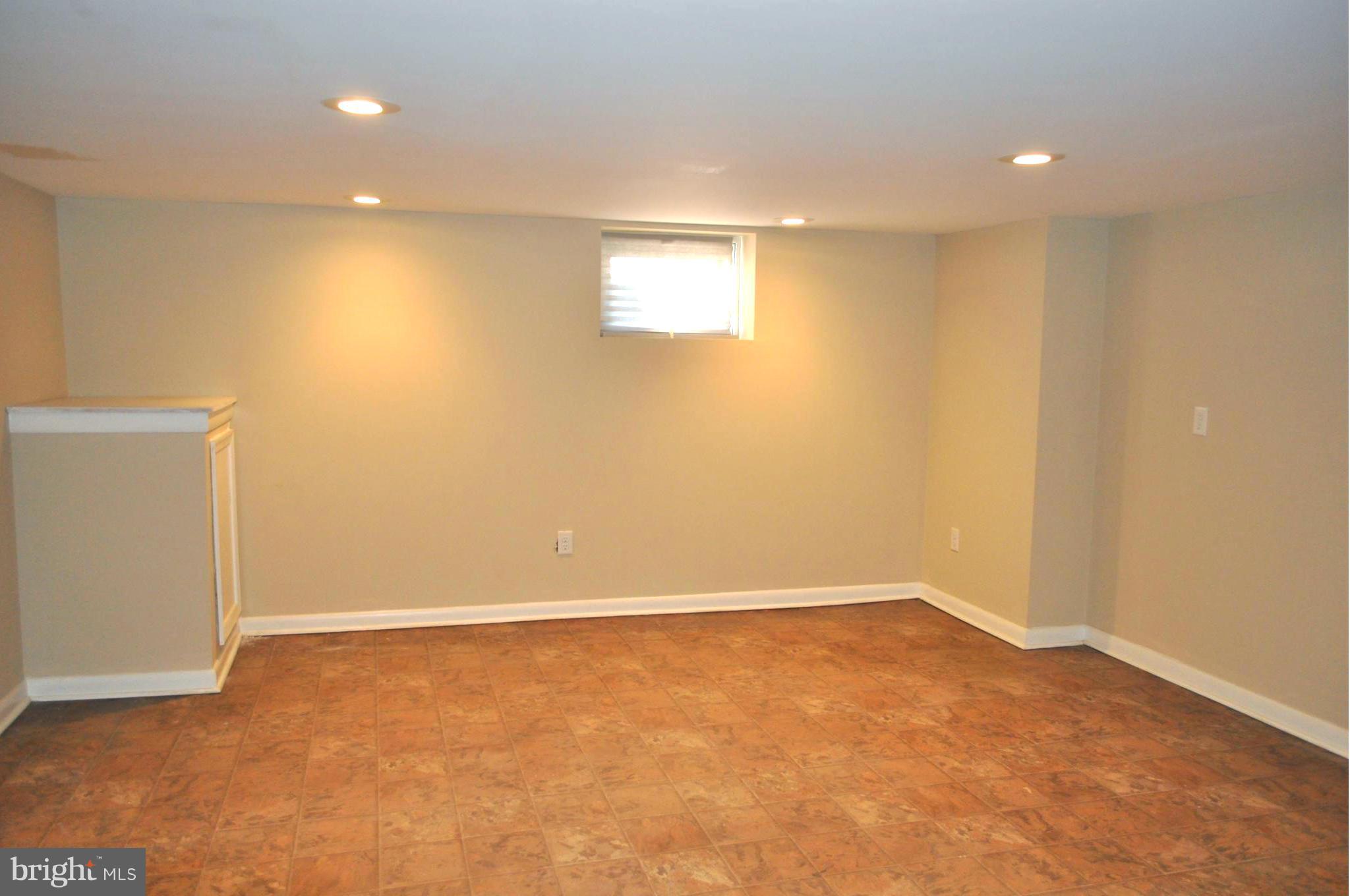 3900 Rexmere Road Baltimore, MD 21218 - Photo 19 of 23 an empty room with a empty space and window