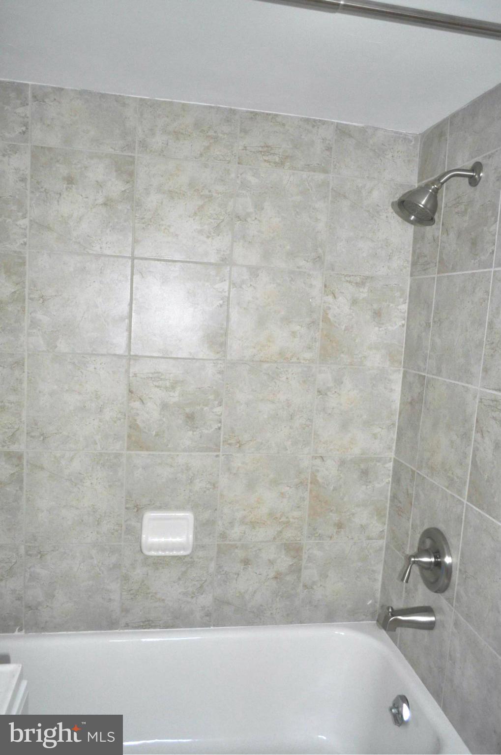 3900 Rexmere Road Baltimore, MD 21218 - Photo 20 of 23 a bathroom with a shower