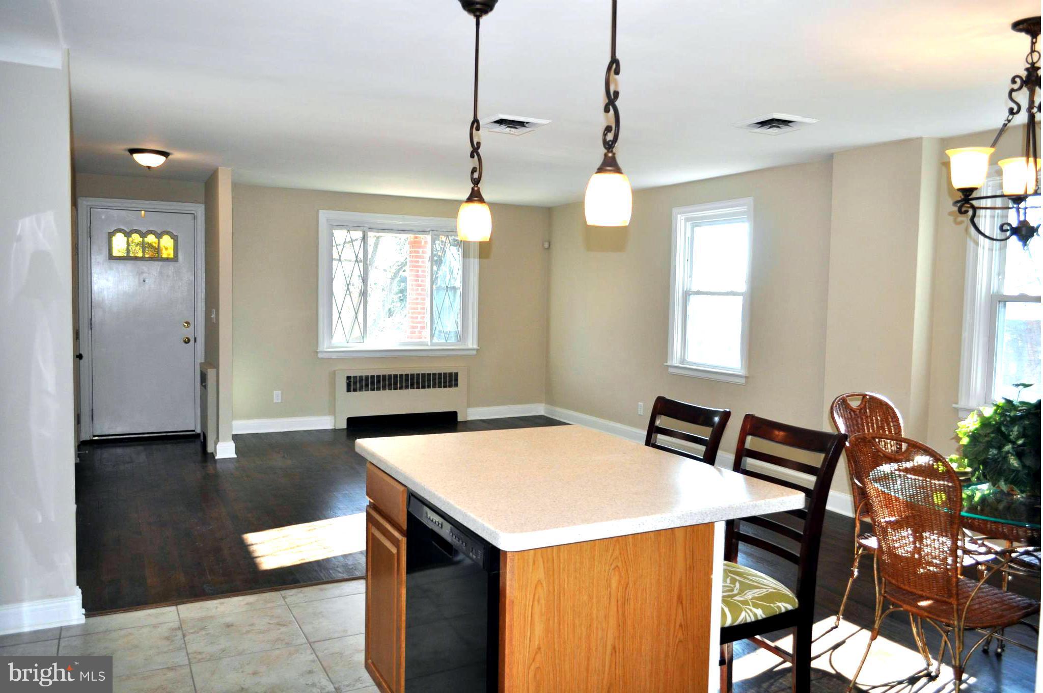 3900 Rexmere Road Baltimore, MD 21218 - Photo 5 of 23 a view of a dining room with furniture and window