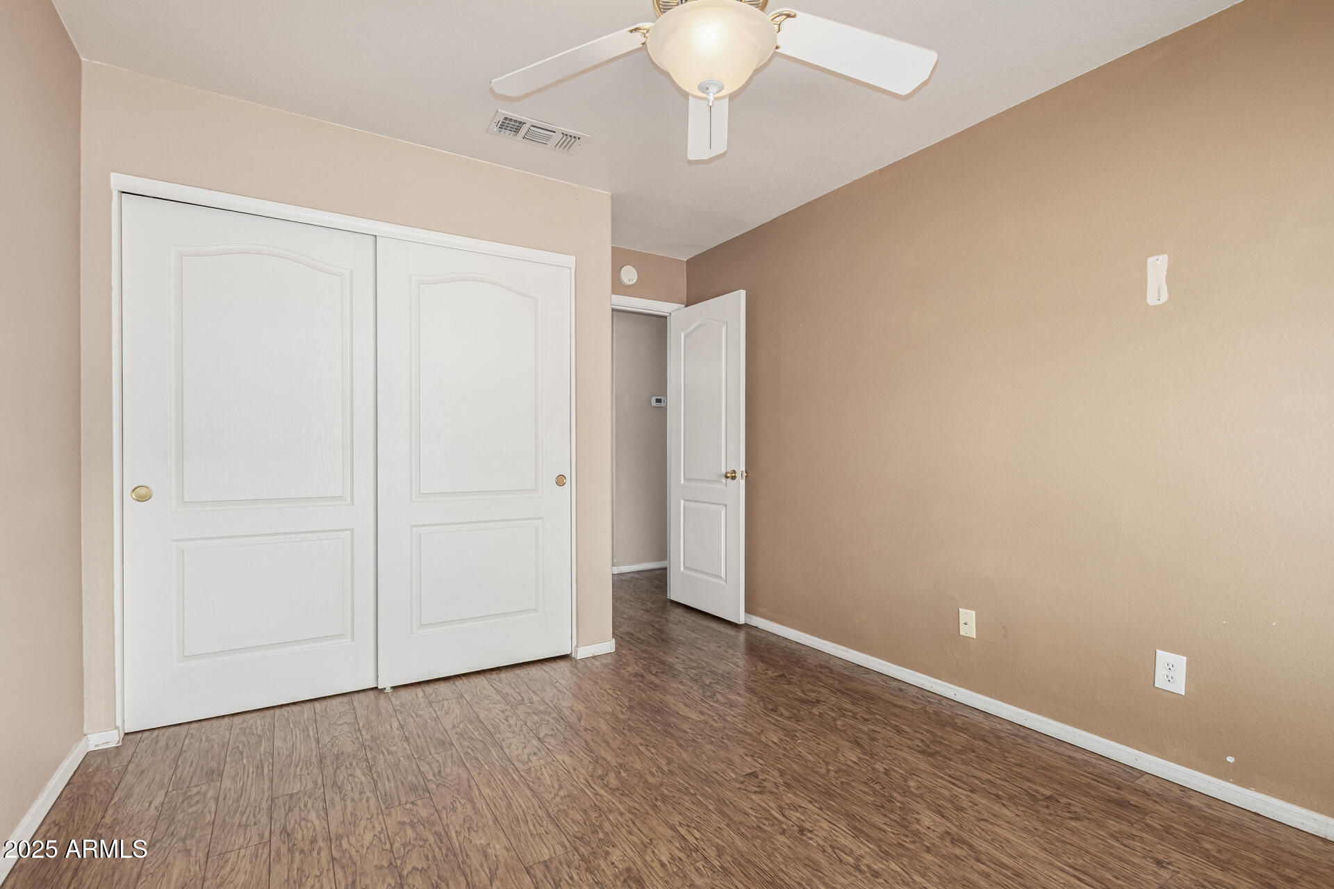 823 West 14th Avenue Apache Junction, AZ 85120 - Photo 15 of 32 a view of an empty room with a chandelier fan