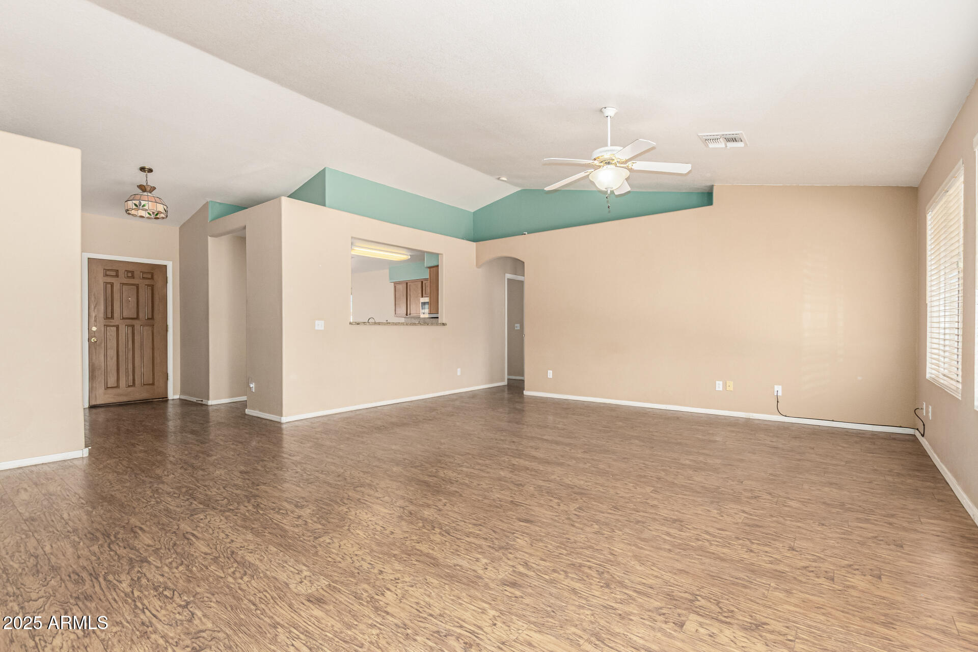 823 West 14th Avenue Apache Junction, AZ 85120 - Photo 7 of 32 a view of an empty room with a window