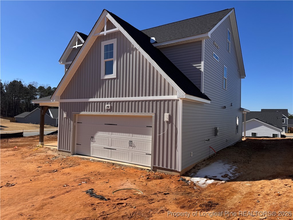 a view of a house with a wooden deck