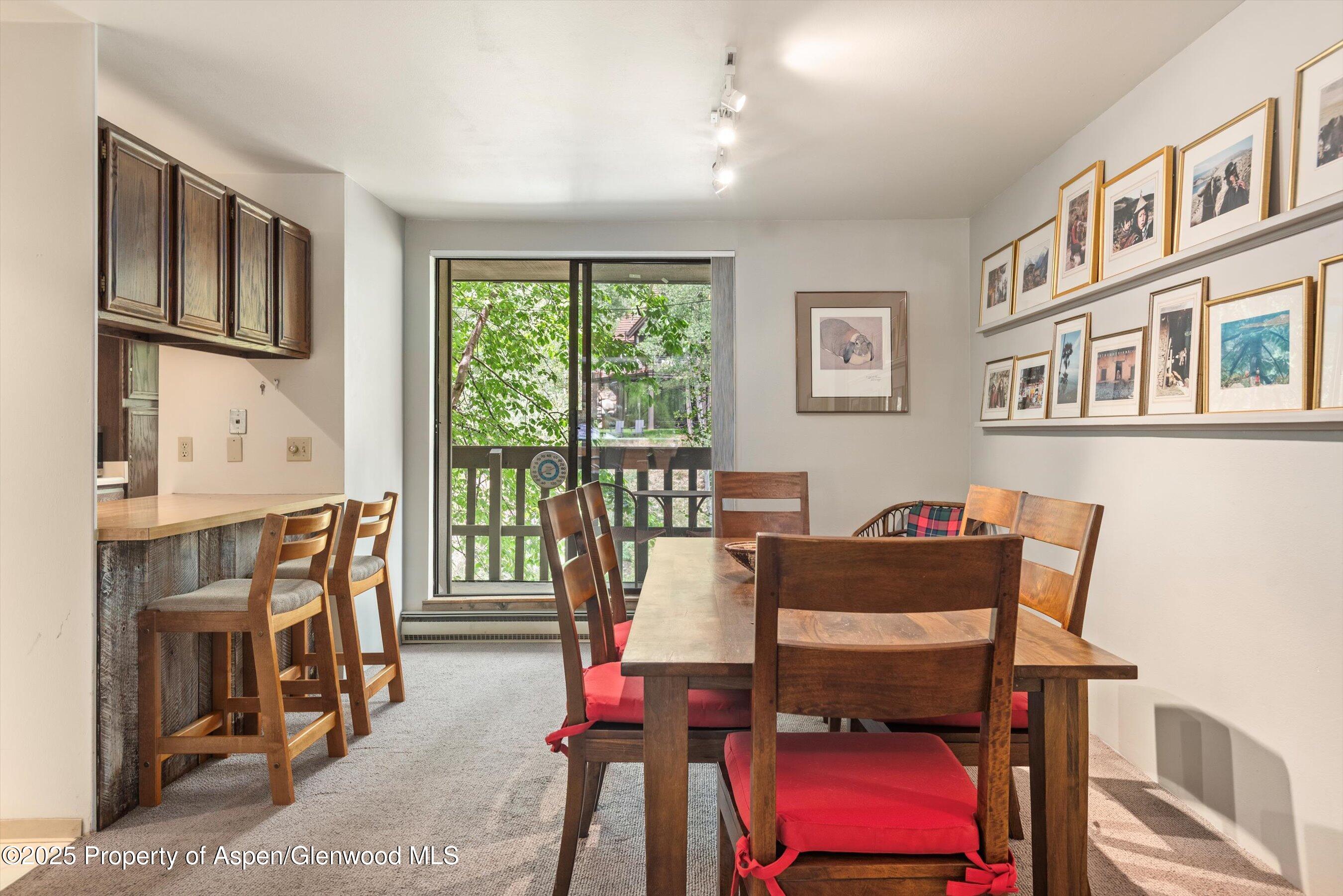 1024 East Hopkins Avenue, Unit 16 Aspen, CO 81611 - Photo 4 of 20 Dining Room and Eating Island