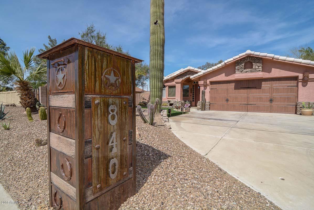 840 East Roberts Road Phoenix, AZ 85022 - Photo 12 of 52 a front view of a house with a yard