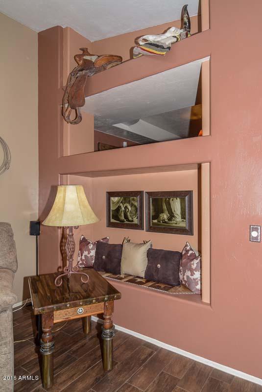 840 East Roberts Road Phoenix, AZ 85022 - Photo 18 of 52 a living room with furniture and a lamp