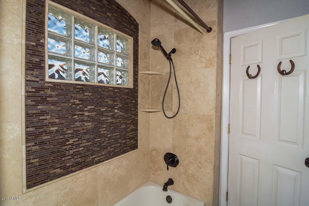840 East Roberts Road Phoenix, AZ 85022 - Photo 42 of 52 a bathroom with a shower