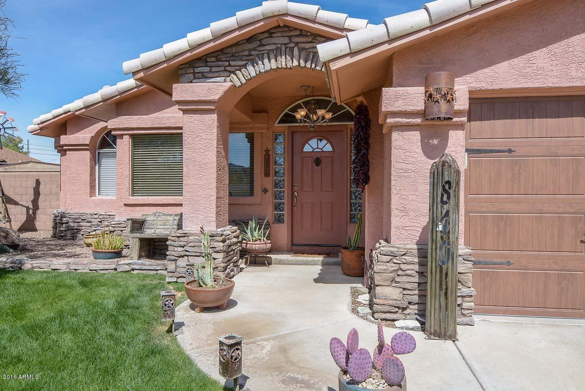 840 East Roberts Road Phoenix, AZ 85022 - Photo 10 of 52 a front view of a house with outdoor seating