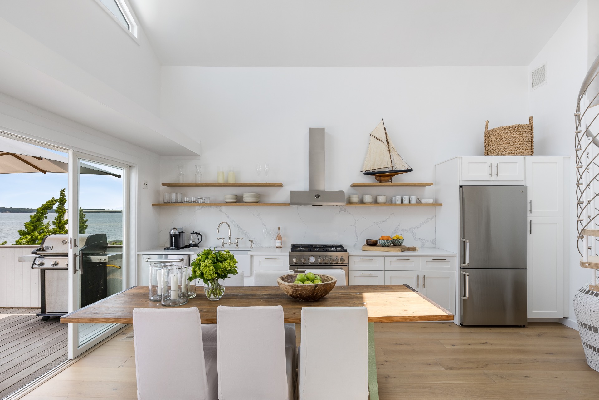 35 Hampton Road Sag Harbor, NY 11963 - Photo 11 of 27 a kitchen with stainless steel appliances granite countertop a refrigerator and a stove