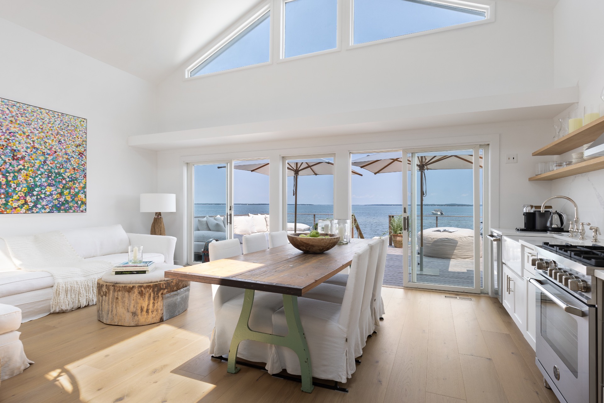 35 Hampton Road Sag Harbor, NY 11963 - Photo 13 of 27 a living room with furniture and a kitchen