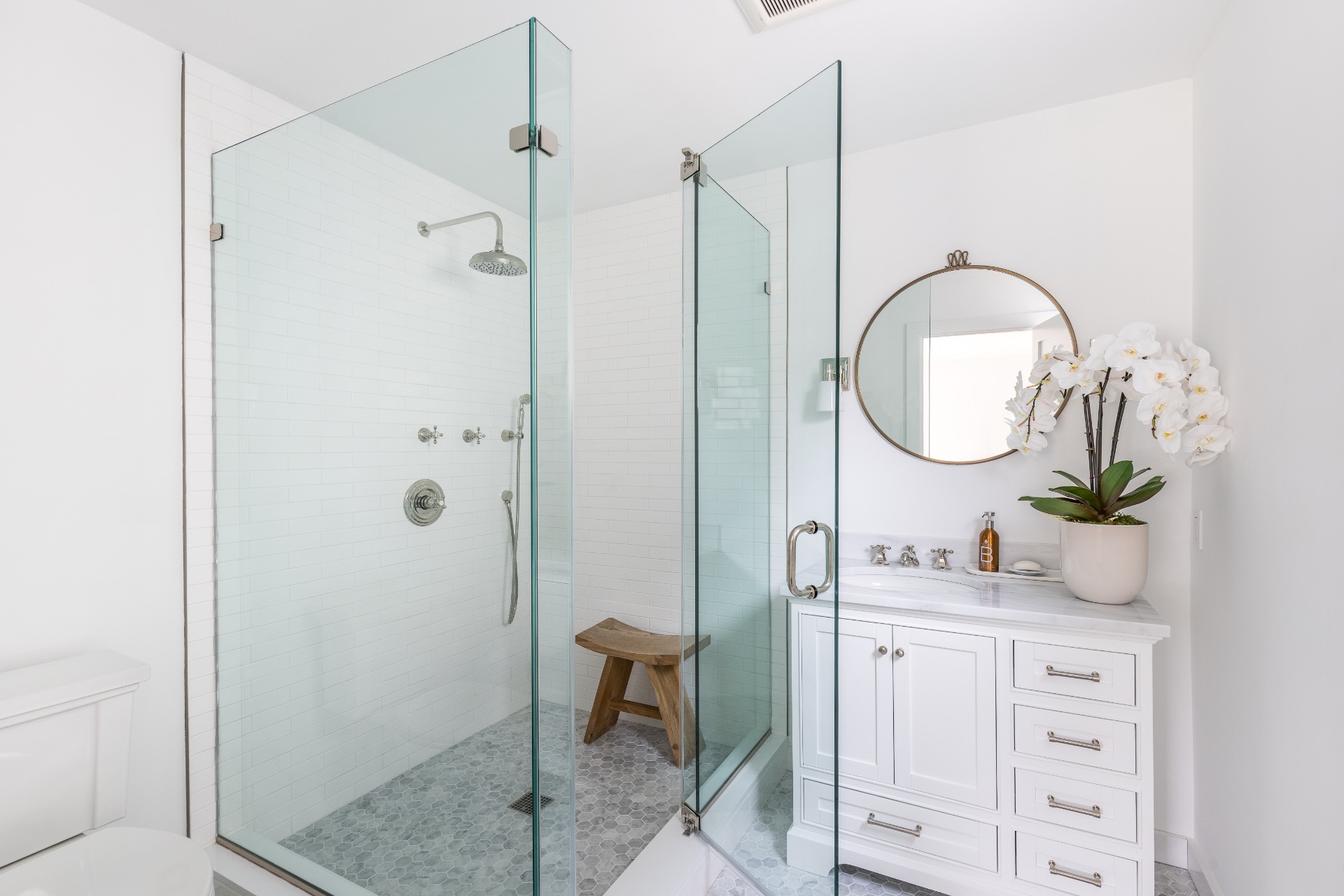 35 Hampton Road Sag Harbor, NY 11963 - Photo 18 of 27 a room with round mirror and shower view