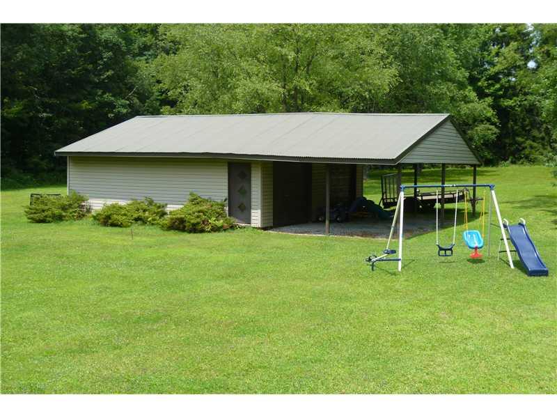 781 Henderson Station Road Stoneboro, PA 16153 - Photo 13 of 13 Other. 2 car garage for storing tractor or whatever.