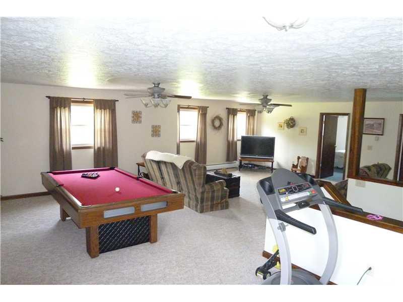 781 Henderson Station Road Stoneboro, PA 16153 - Photo 5 of 13 Family Room. A 4th bedroom could easily be carved out of the huge family room.