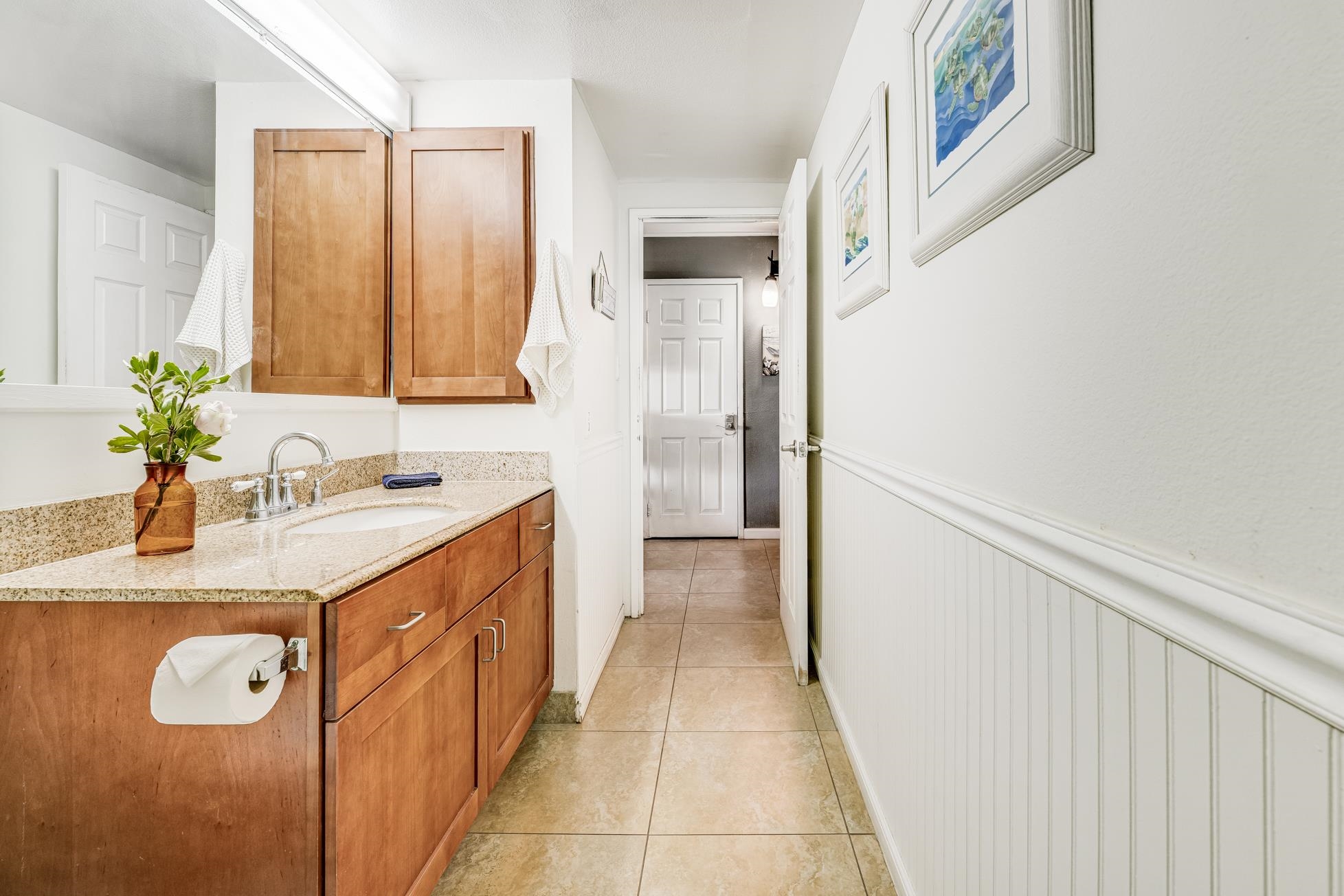 1993 South Kihei Road, Unit 311 Kihei, HI 96753 - Photo 18 of 31 a bathroom with a sink double vanity and a mirror
