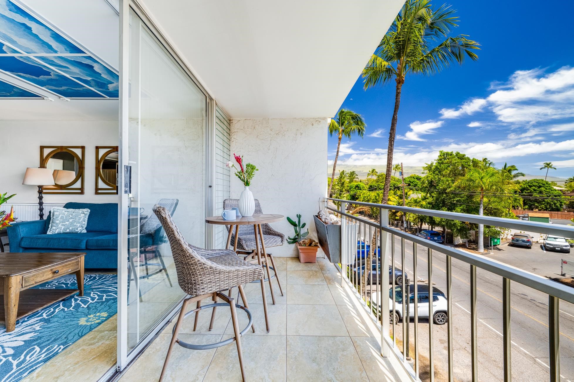 1993 South Kihei Road, Unit 311 Kihei, HI 96753 - Photo 21 of 31 a view of balcony with wooden floor and outdoor seating