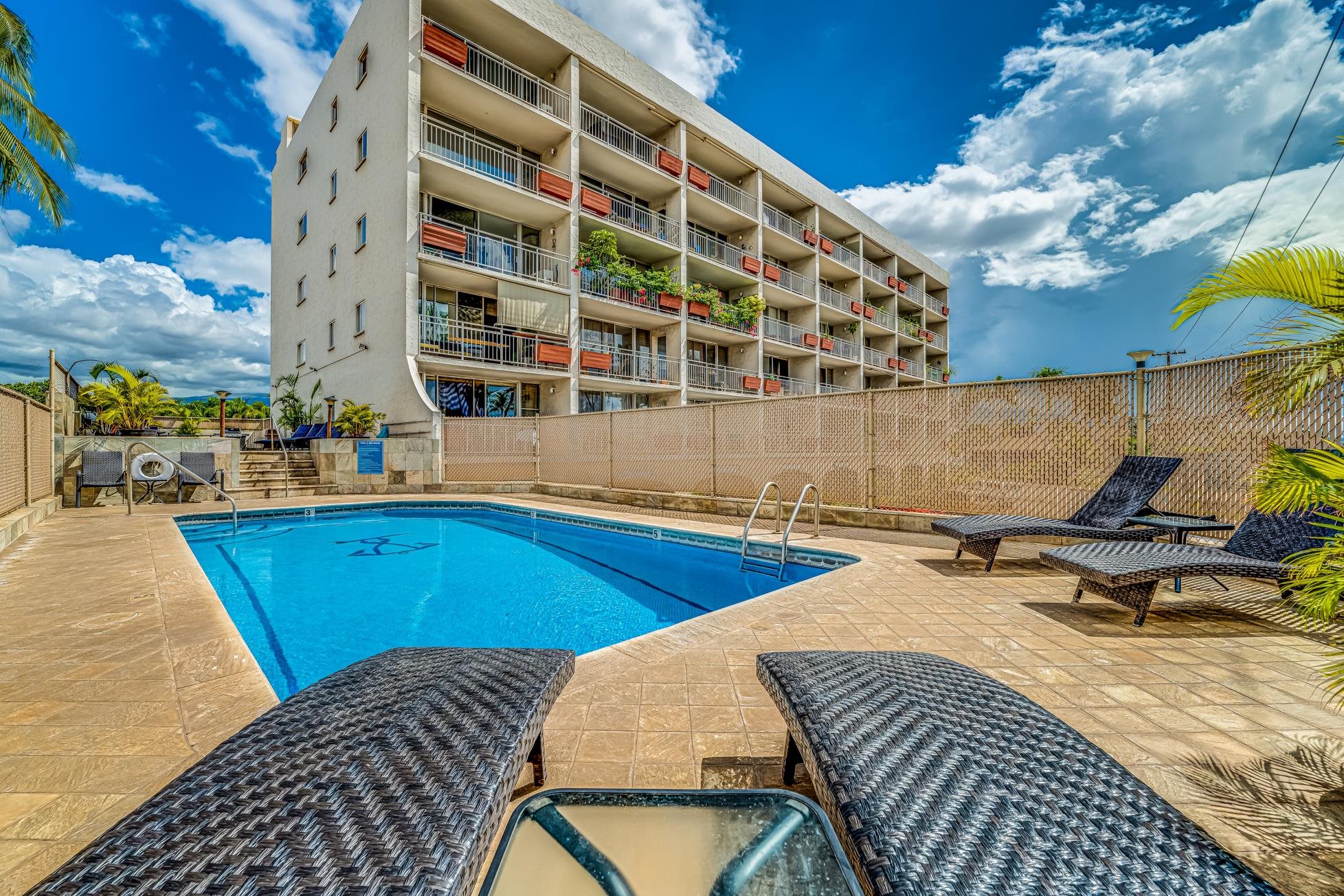 1993 South Kihei Road, Unit 311 Kihei, HI 96753 - Photo 23 of 31 a view of a swimming pool with outdoor seating