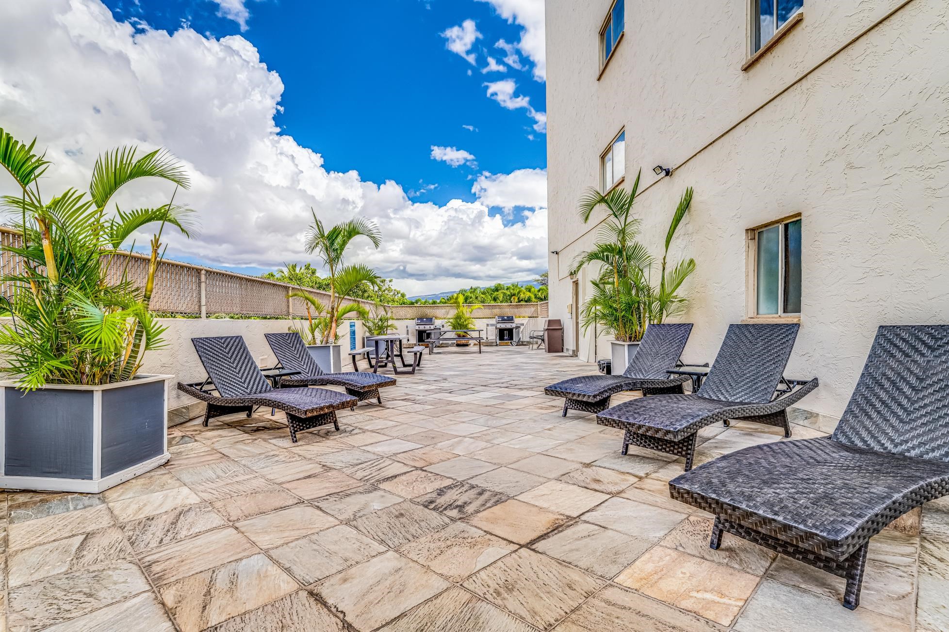 1993 South Kihei Road, Unit 311 Kihei, HI 96753 - Photo 27 of 31 a outdoor space with lots of furniture and a couch