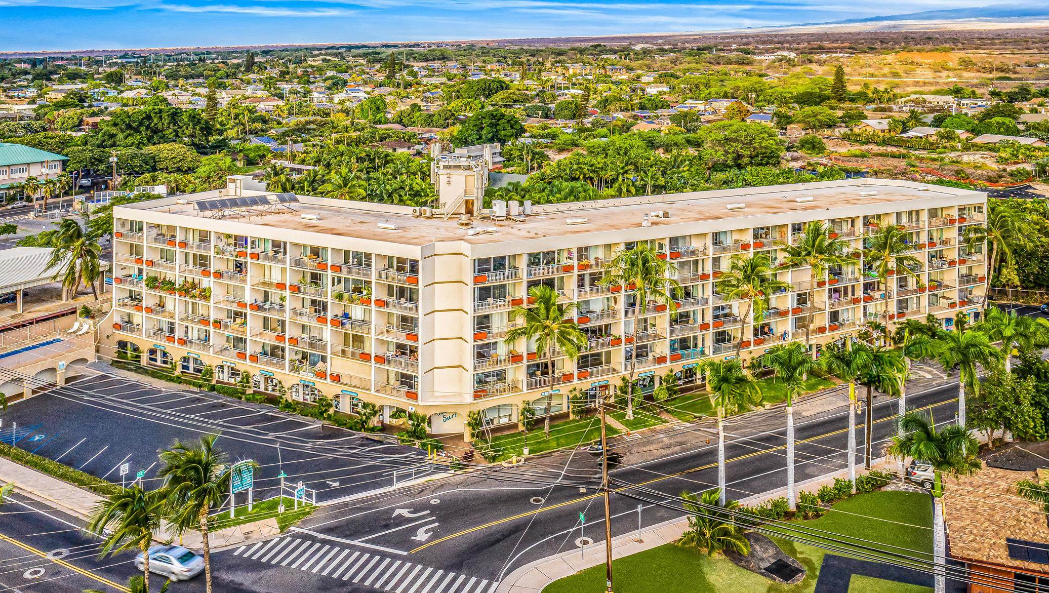 1993 South Kihei Road, Unit 311 Kihei, HI 96753 - Photo 29 of 31 a view of a balcony with wooden floor and city view